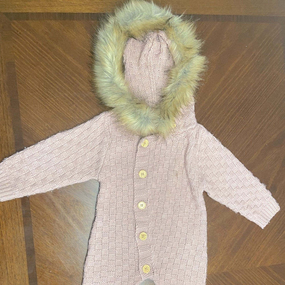 Knitted jumpsuit with faux fur